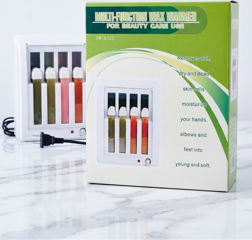 Multi-function wax warmer packaging with colored wax sticks on a marble surface.